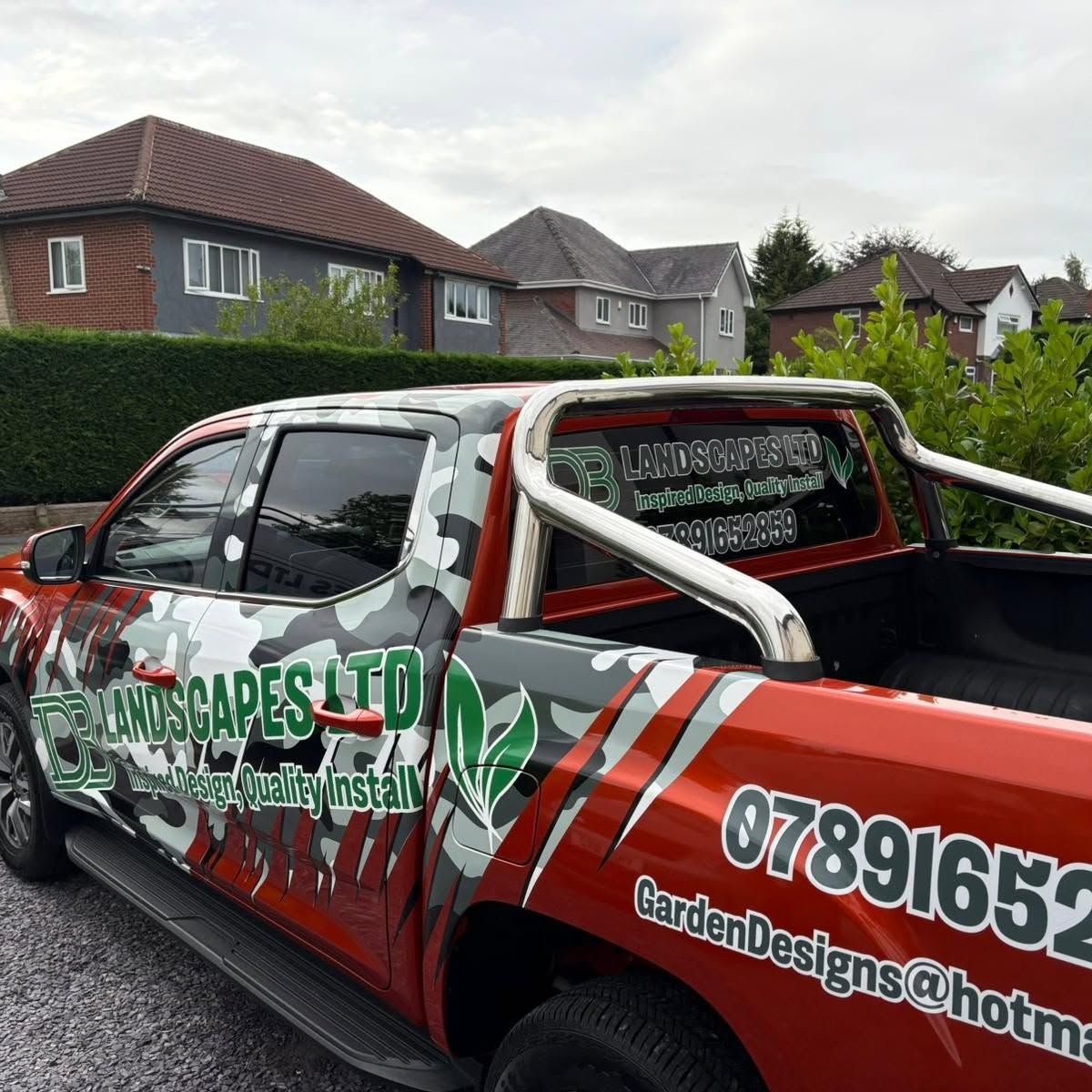 The DB Landscapes Ltd liveried van, parked on site for a landscape gardening project in Stockport