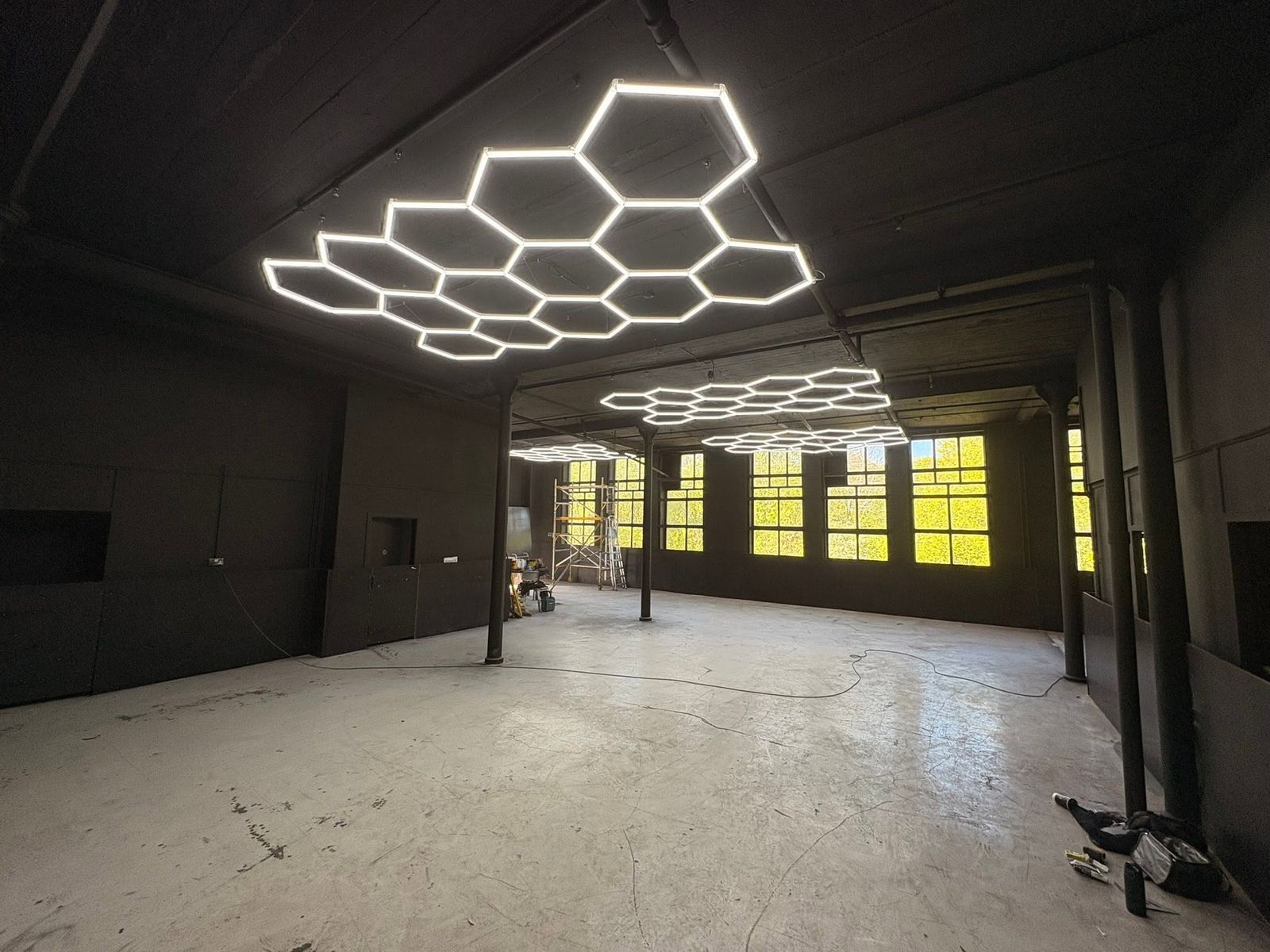 Bespoke hexagonal LED lighting installation for a commercial fit-out by DB Landscapes Ltd